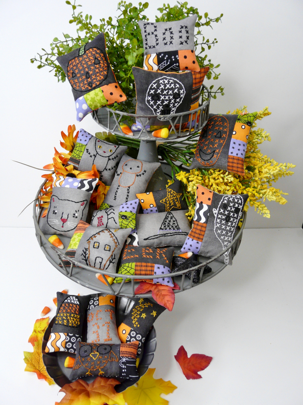 Halloween embroidery patchwork ornaments on dark fabric pattern