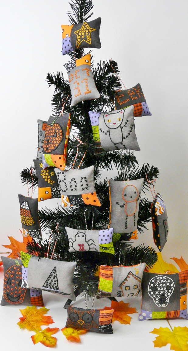 Halloween embroidery patchwork ornaments on dark fabric pattern