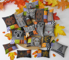Halloween embroidery patchwork ornaments on dark fabric pattern